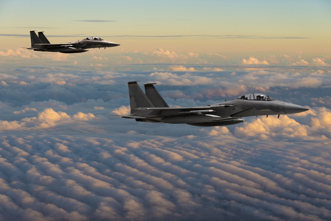 jet fighters above the clouds